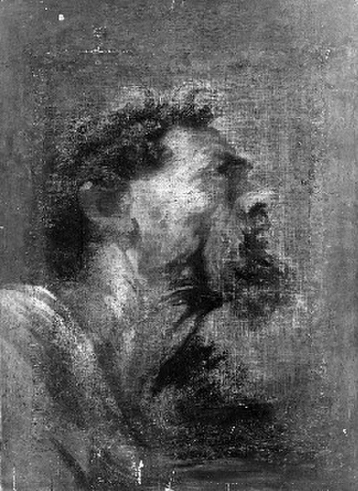 Head of a man in profile looking up
