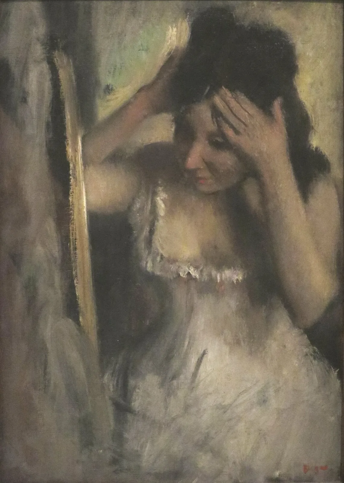 Woman Combing her Hair before a Mirror