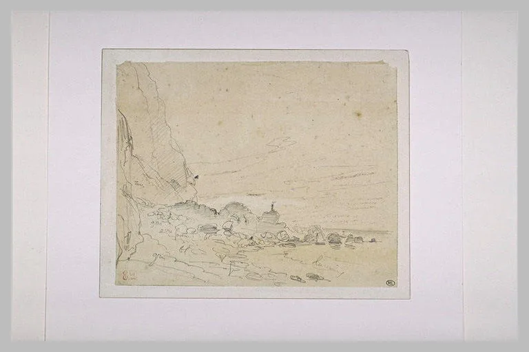 Bord de mer avec falaises, rochers et galets