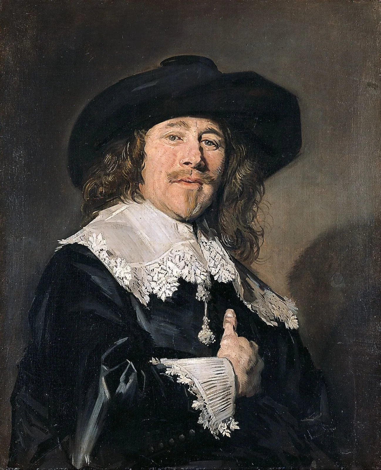 Portrait of a man with his hand on his chest
