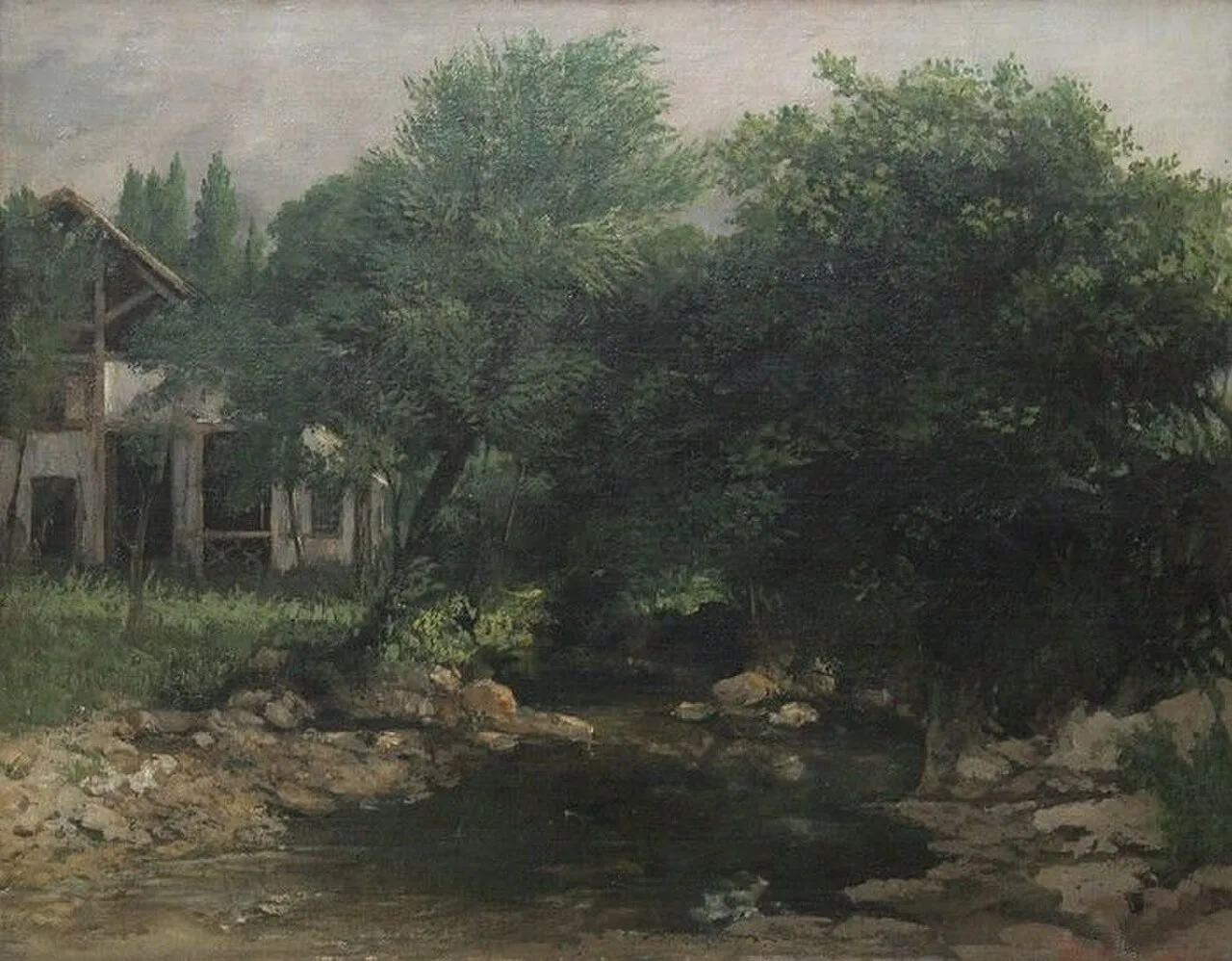 Ferme au bord d'un étang