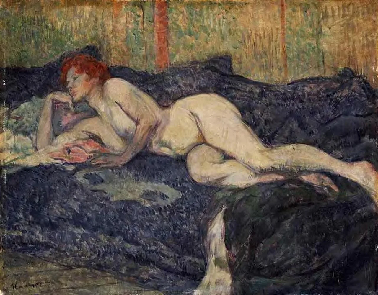 Naked woman stretched on a couch