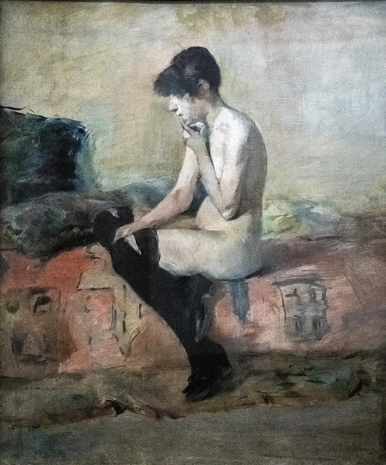 Nude study. Woman sitting on a couch