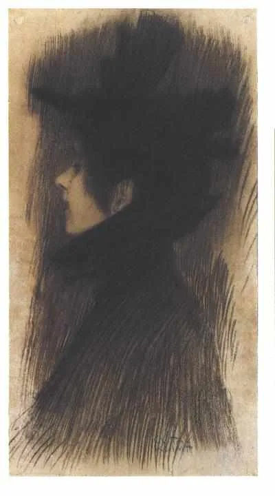 Girl with hat and cape in profile