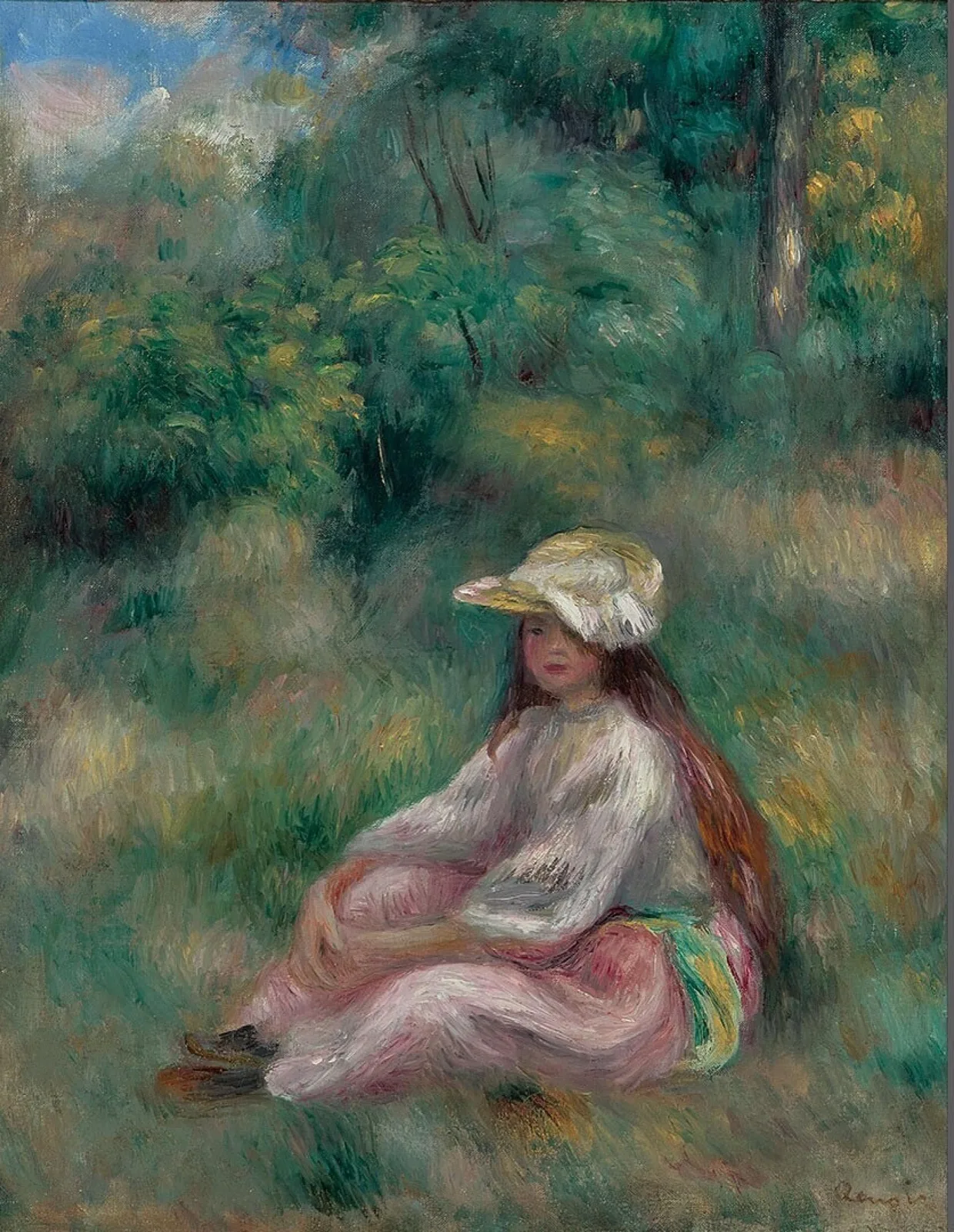 Jeune fille en rose dans un paysage