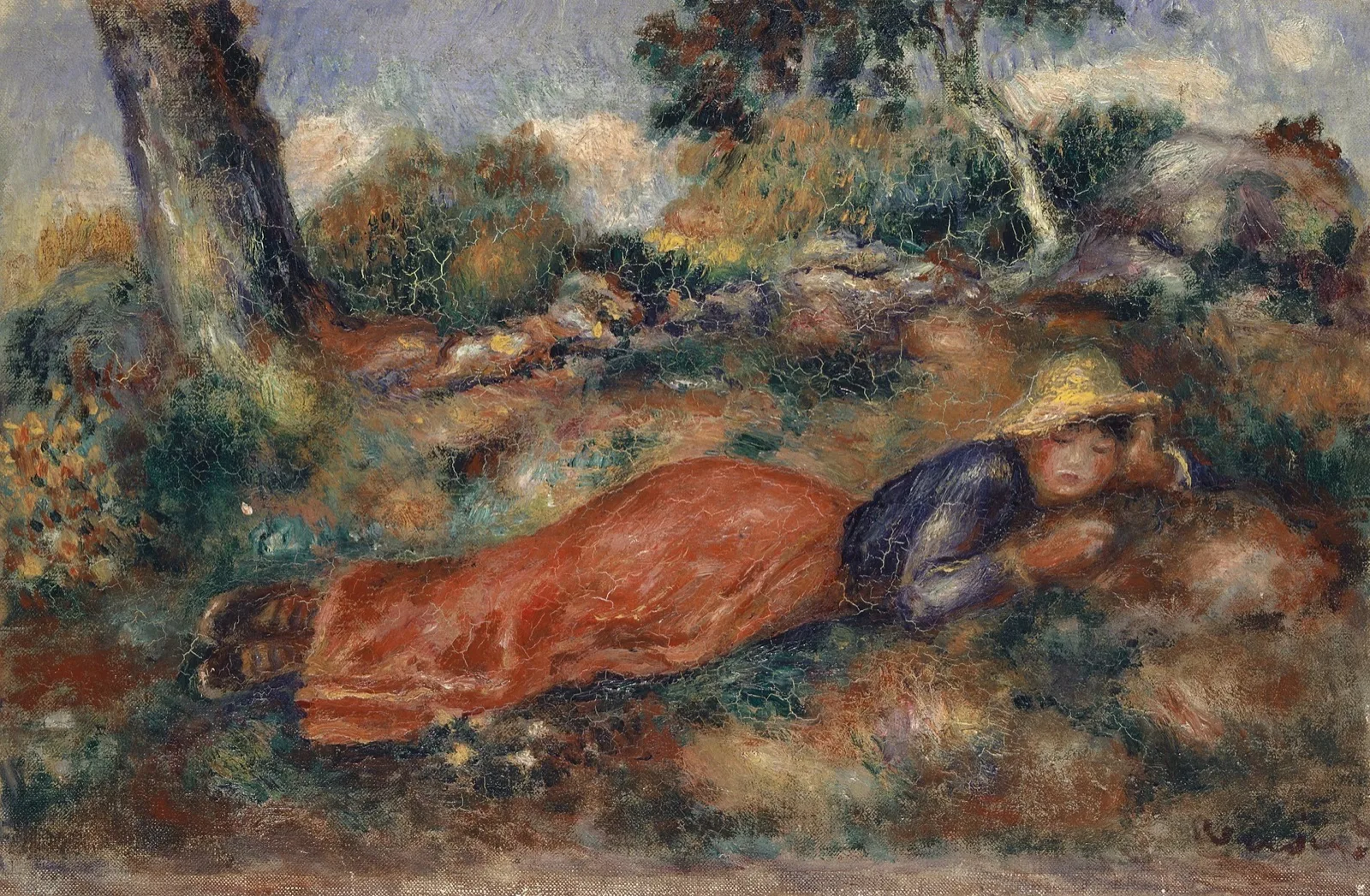 Jeune fille couchée sur l'herbe