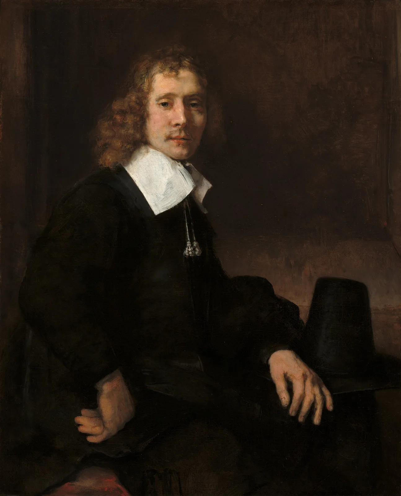 Young Man Seated at a Table