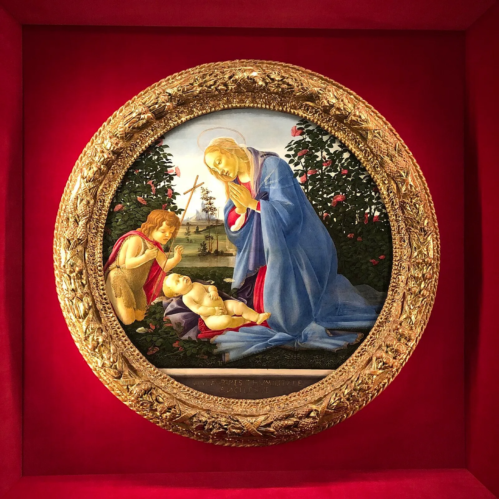 Madonna adoring the Child with St. John the Baptist