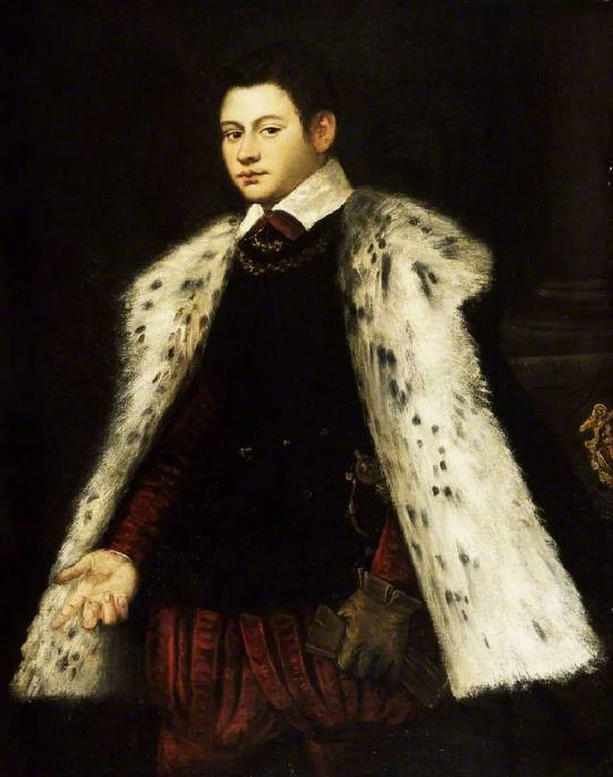Young man in a fur cloak