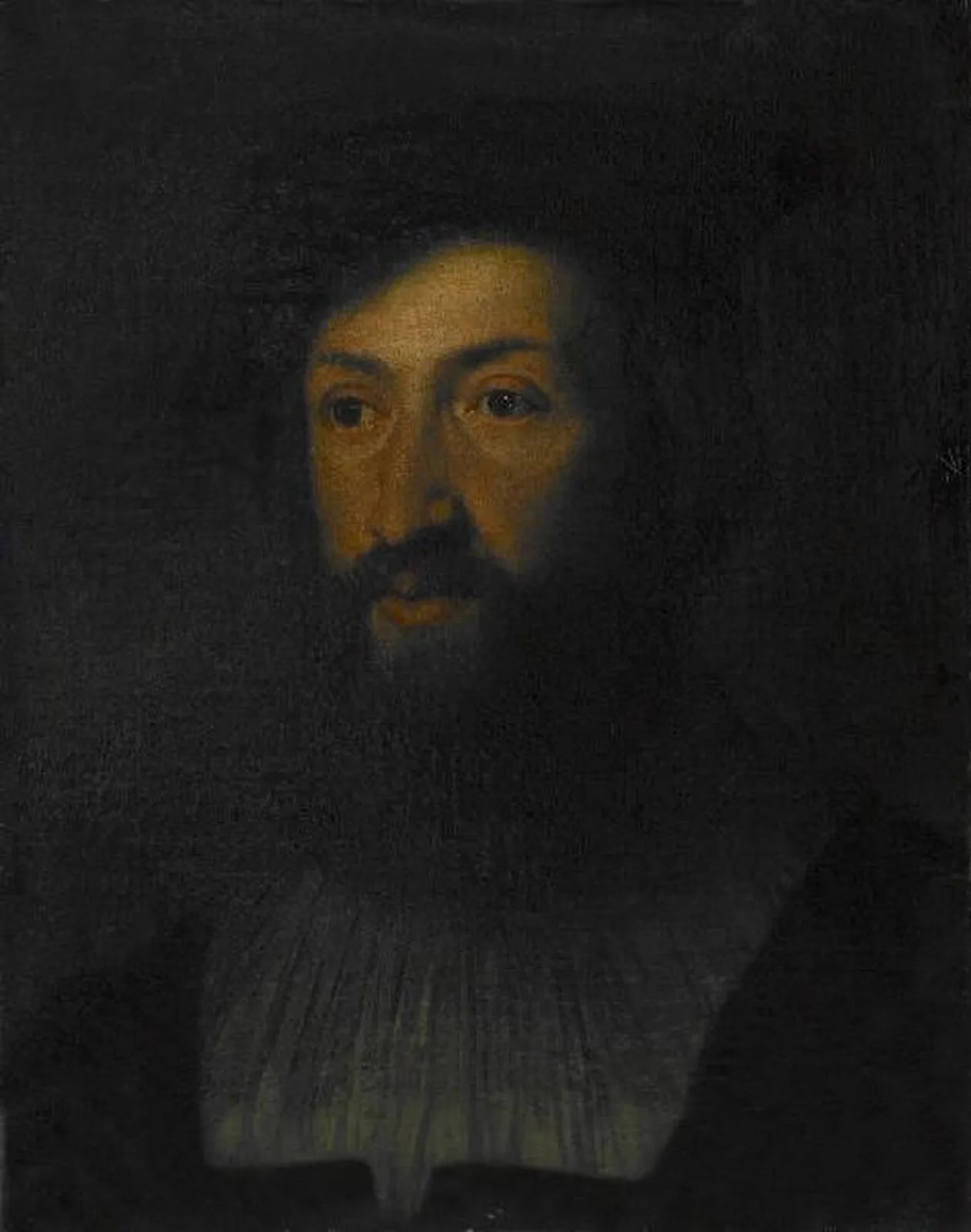 Portrait of a man with a black cap