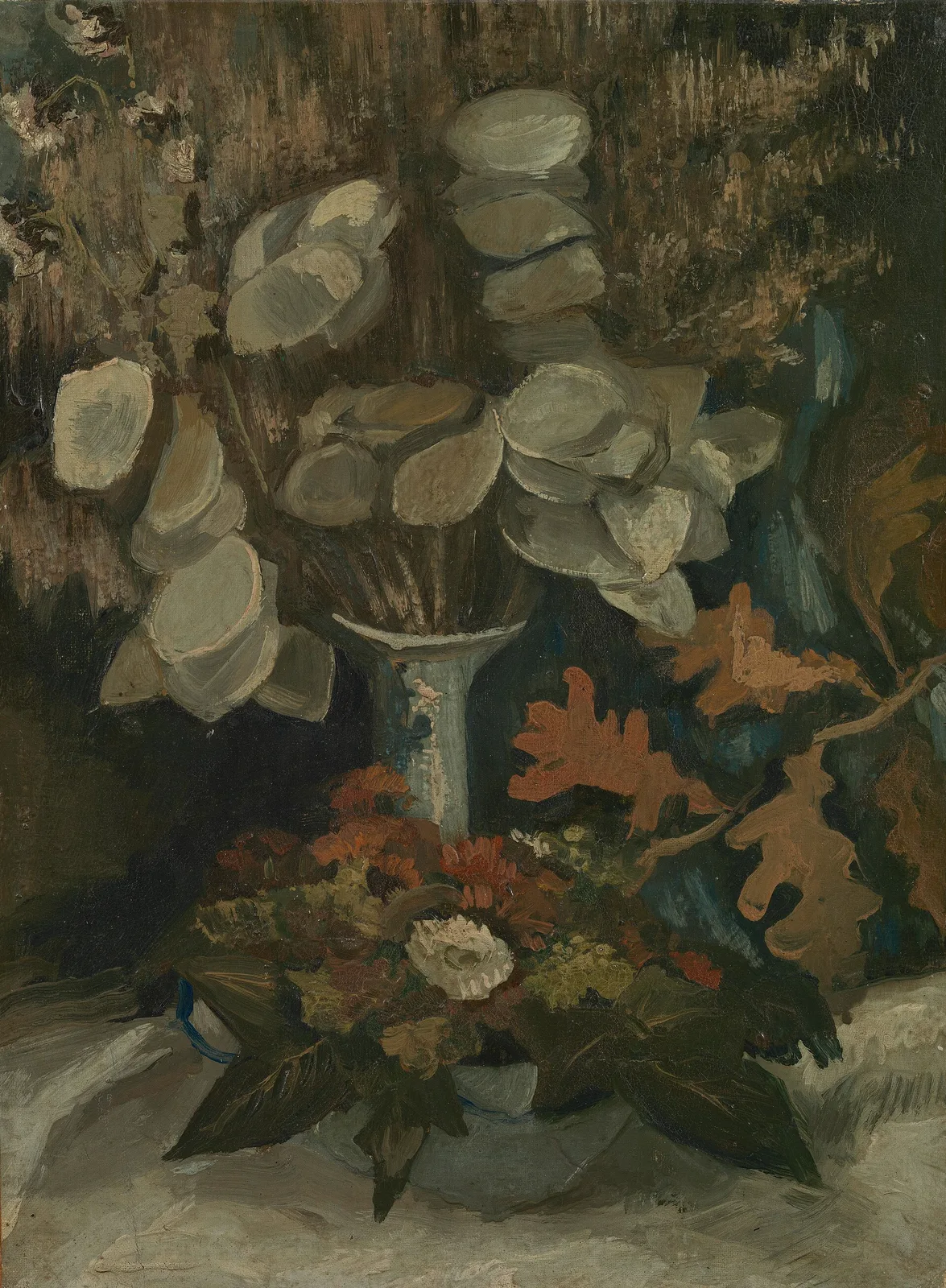 Still life: satin flowers and a bowl with leaves and flowers