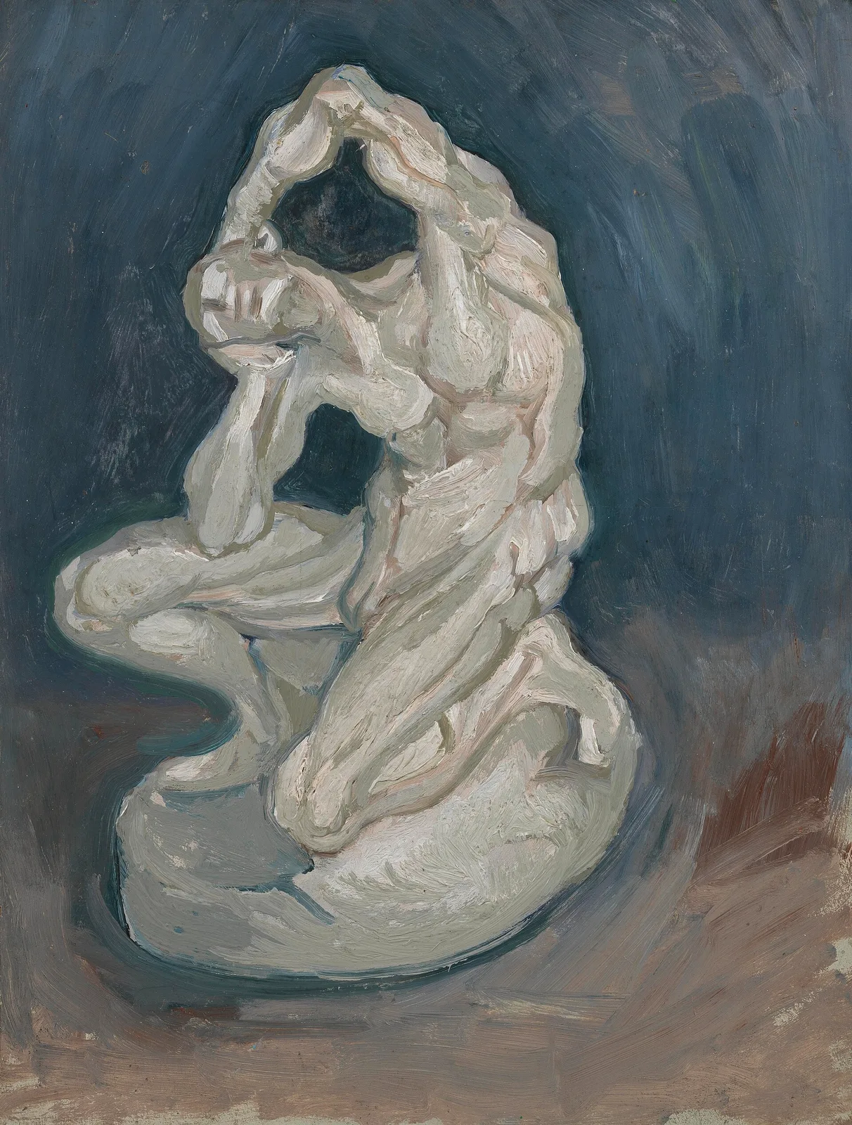 Plaster statuette: man kneeling