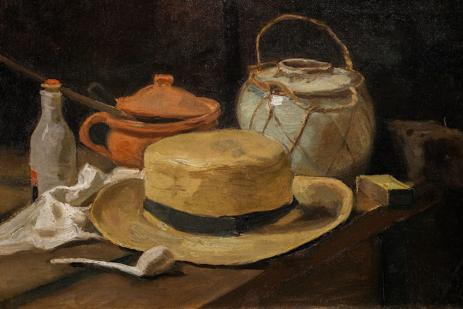 Still life with straw hat and pipe