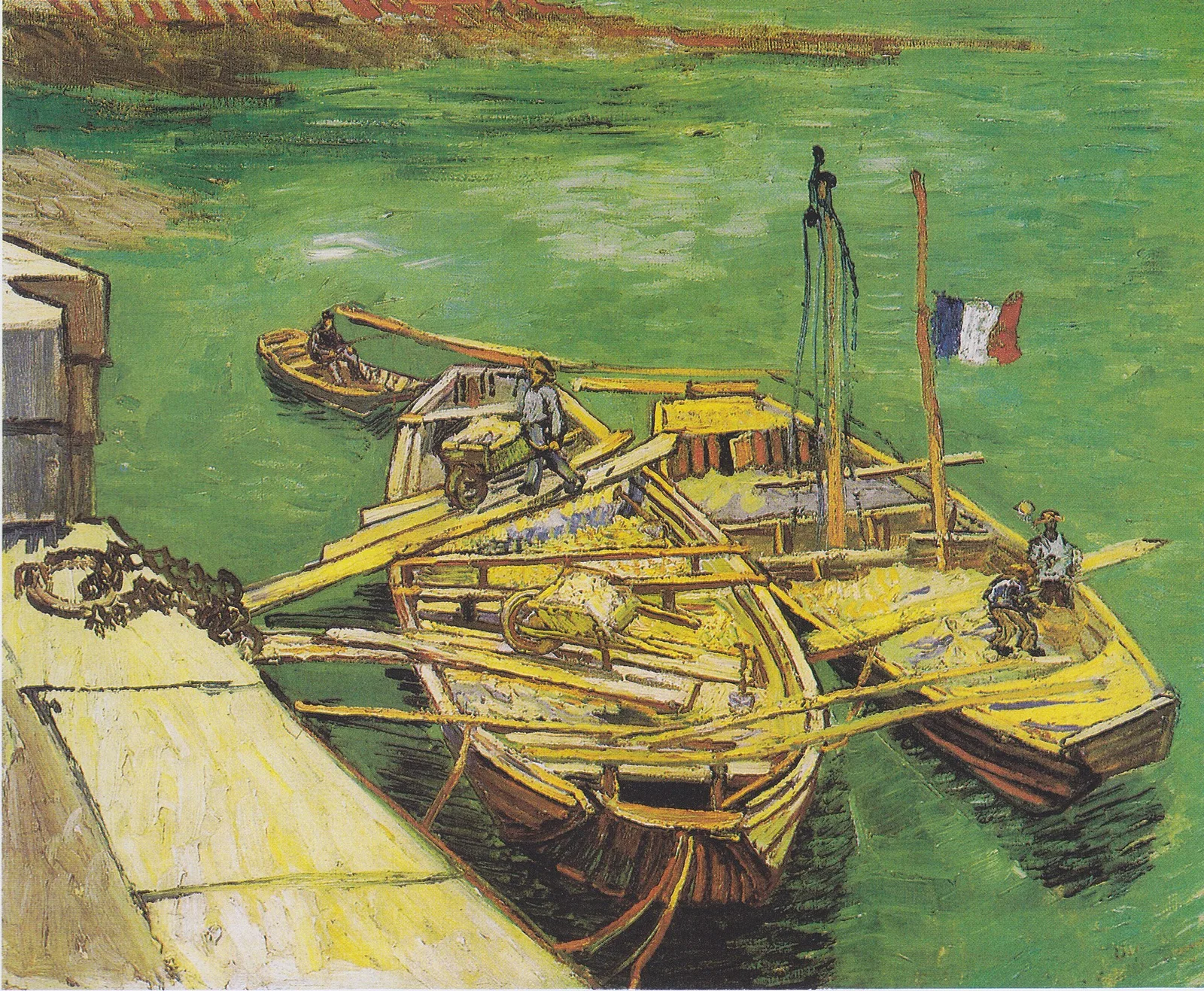 Boats with men unloading sand