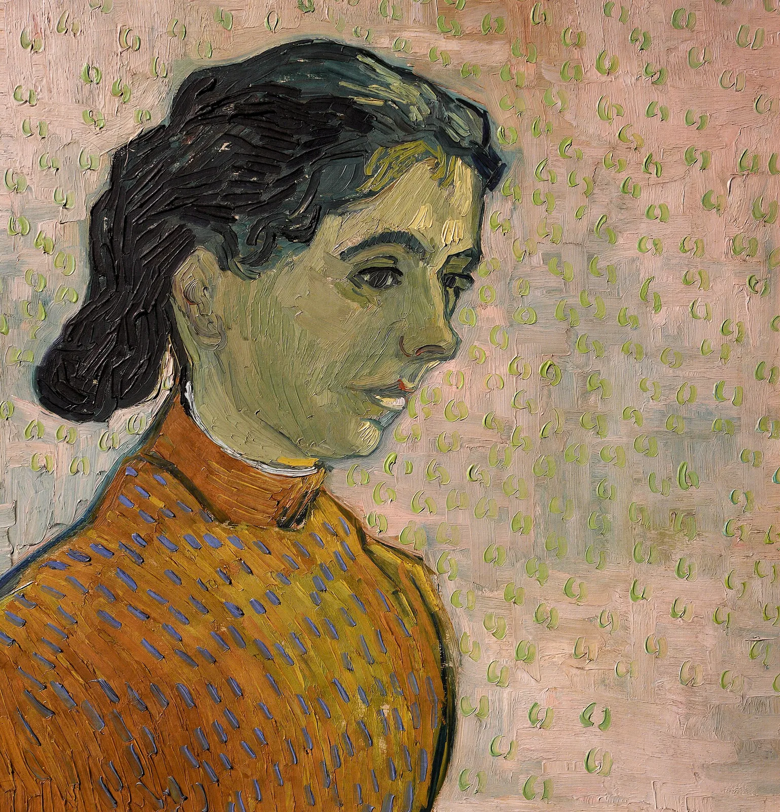 Portrait of a young girl against a pink background