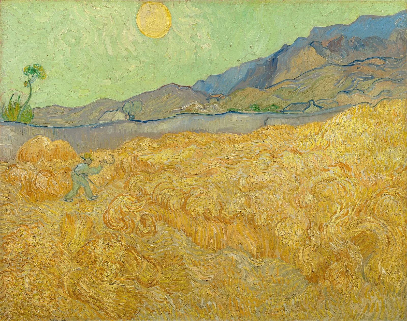 The wheatfield behind Saint Paul's hospital at the fall of the day with a reaper