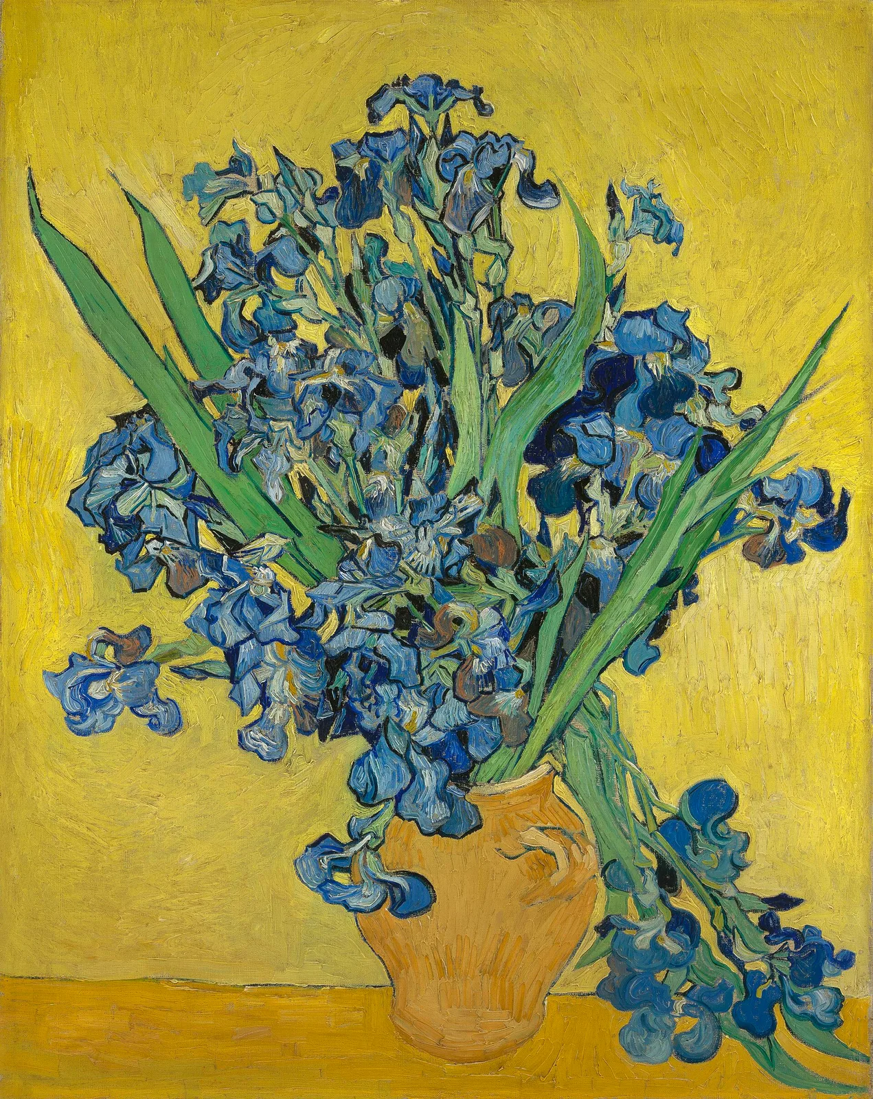Still life: vase with irises against a yellow background