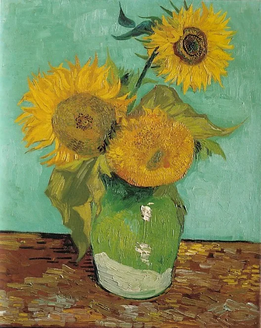 Still life: vase with three sunflowers